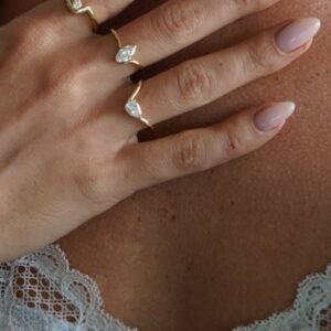 gold solitaire tension engagement ring