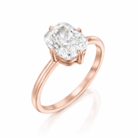 טבעת אירוסין עם יהלום בחיתוך קושן וארבע שיניים על גבי טבעת רוז גולד